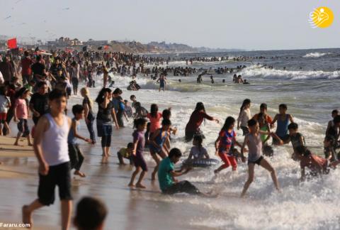 تفریح فلسطینی ها در ساحل غزه/عکس
